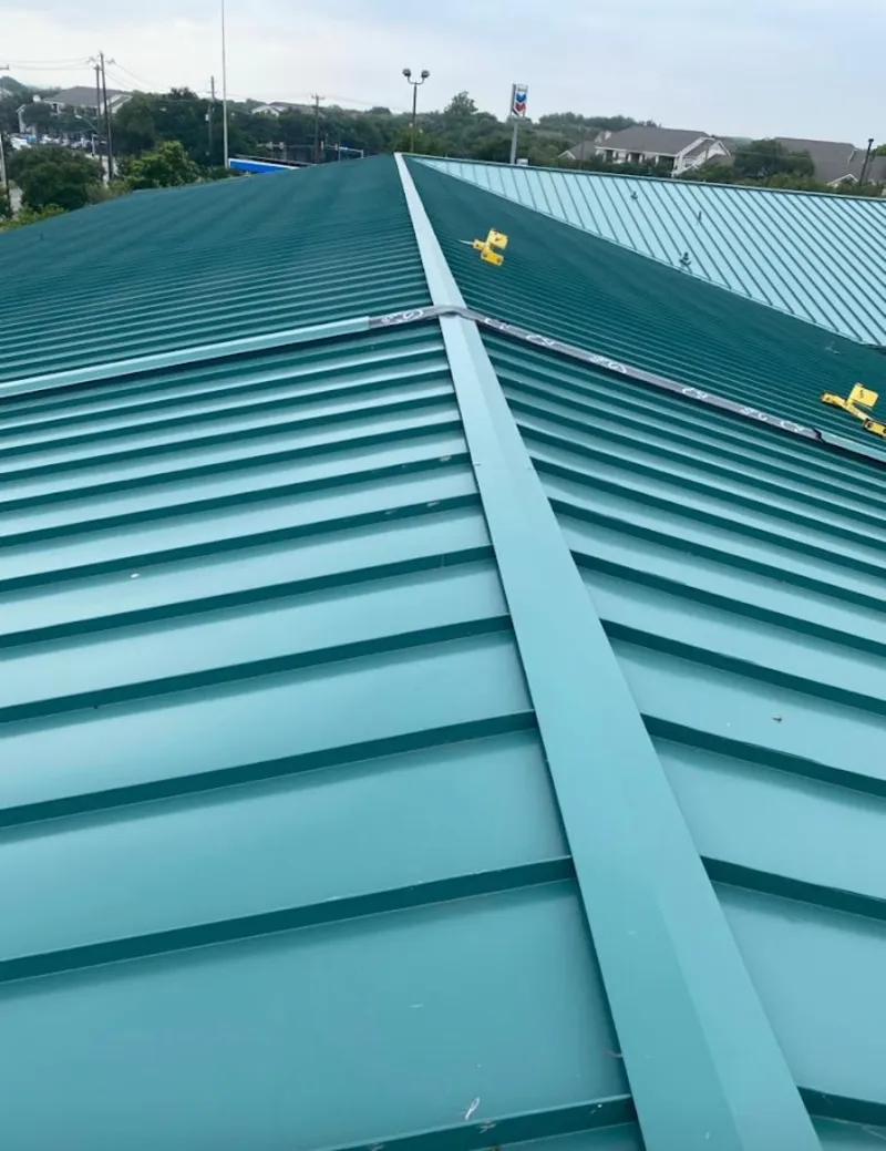 Green commercial metal roof ridge and valley for Metal Roof Repair in Canal Winchester
